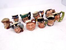 Ten miniature Royal Doulton character jugs to include Merlin, Dick Turpin, Long John Silver,