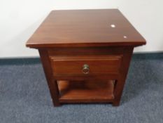 A contemporary lamp table fitted a drawer