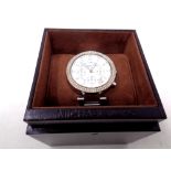 A Michael Kors lady's chronograph and date function watch with box and instructions