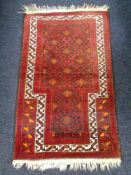 An Afghan prayer rug,