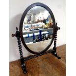 An Edwardian dressing table mirror on barley twist supports