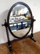 An Edwardian dressing table mirror on barley twist supports