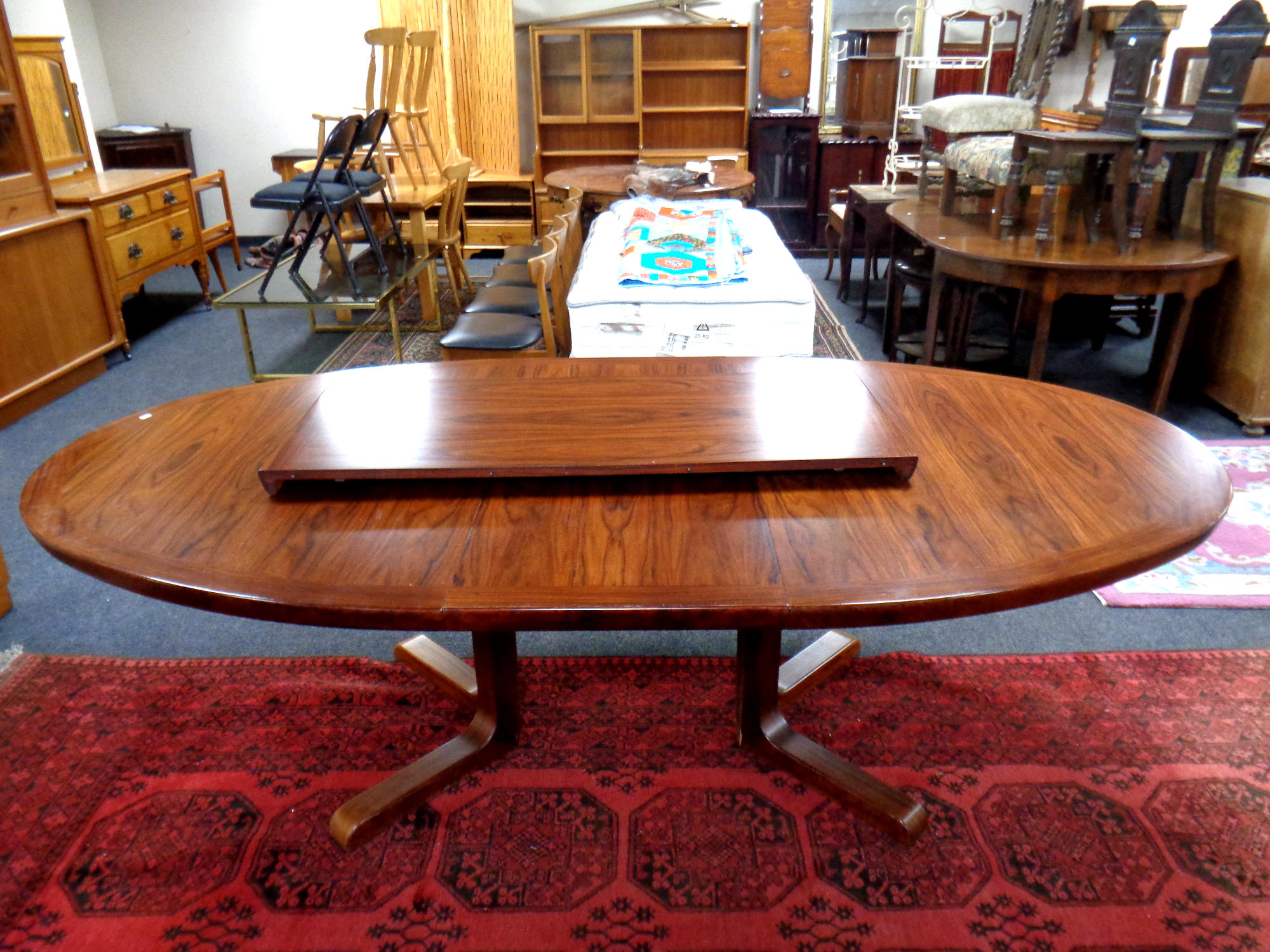 A 20th century Skovby rosewood oval extending dining table with two leaves together with a set of - Image 2 of 2