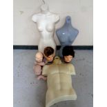 A crate of three twentieth century mannequin torso,