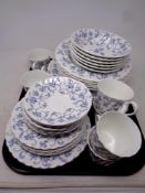 A tray of forty two pieces of Aynsley Madrigal blue tea and dinner china