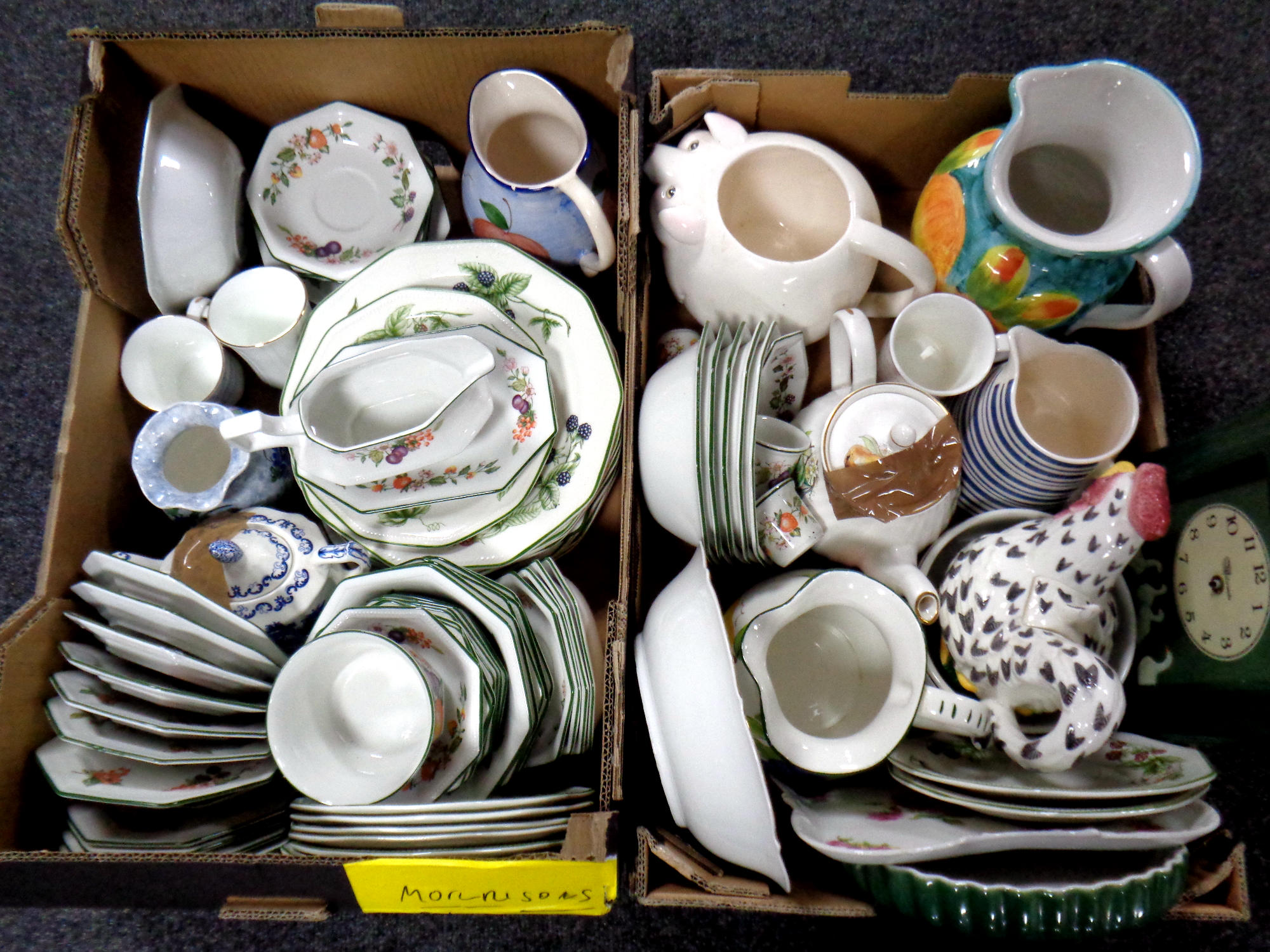 Two boxes of assorted ceramics, teapots, jugs,