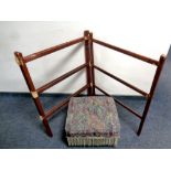 A footstool on pine legs together with an early twentieth century three fold towel rail