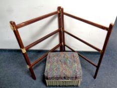 A footstool on pine legs together with an early twentieth century three fold towel rail