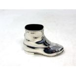 A large heavy silver pin cushion in the shape of a boot, John Grinsell & Sons,