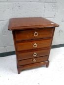 A Stag Minstrel four drawer bedside chest, width 53 cm.