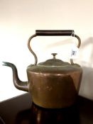 A 19th century copper kettle