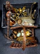 A wicker log basket and crate of assorted metal ware, companion pieces, pair of ornamental axes,