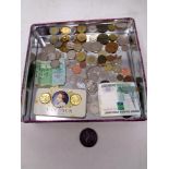 A box of assorted coins and banknotes to include foreign coinage, 1797 cartwheel penny,