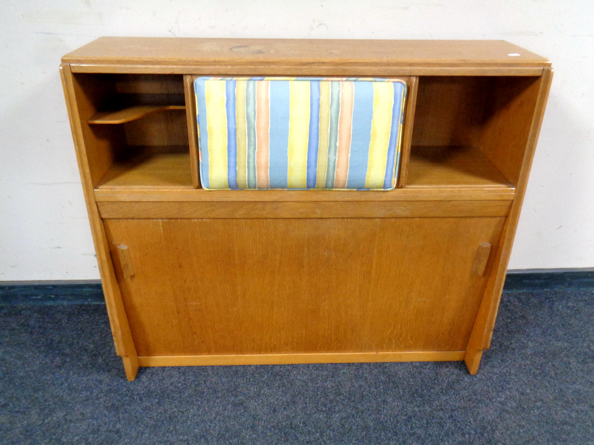 A 20th century sliding door bookcase