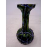 An Art Nouveau green glass vase with silvered overlay, height 15.