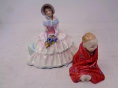 Two Royal Doulton figures;