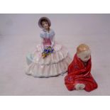 Two Royal Doulton figures;