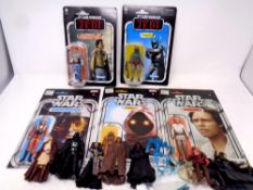 Large collection of Star Wars figures and comics to include: Boba Fett (still attached to card),