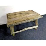 A rustic wooden garden table