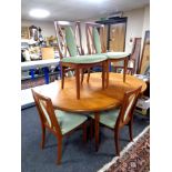 A twentieth century teak G-plan extending dining table, six chairs, length 168 cm.