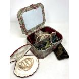 A large box of costume jewellery, Japanese cigarette case, necklaces etc.