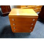 A twentieth century teak four drawer chest