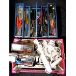 A box of extension leads, power tools,