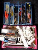A box of extension leads, power tools,