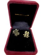 A pair of 18ct gold Chinese character earrings