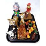 A tray of folk art pottery figures, nativity items,