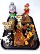 A tray of folk art pottery figures, nativity items,