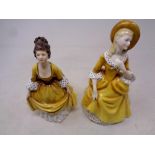 Two Royal Doulton figures;