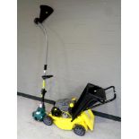 A Challenge petrol lawn mower together with a petrol strimmer