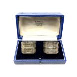 A pair of boxed Victorian silver napkin rings,