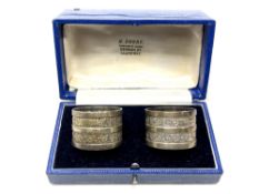 A pair of boxed Victorian silver napkin rings,