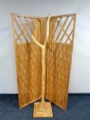 A two-fold screen together with a wooden hat and coat stand