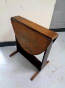 An Edwardian flap sided occasional table CONDITION REPORT: height 50 cm width 50 cm