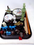 A tray of Oriental resin and ceramic figures, hand fan, flute,
