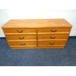 A twentieth century teak G-plan six drawer chest, width 140 cm.