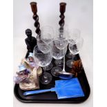 A tray of Edwardian pottery bookends, barley twist candlesticks, wine glasses,