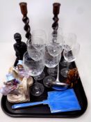 A tray of Edwardian pottery bookends, barley twist candlesticks, wine glasses,