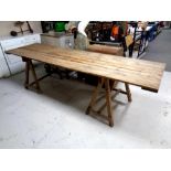 A pine trestle table length 270 cm.