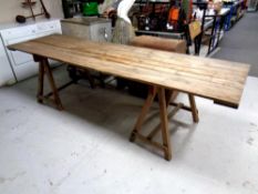 A pine trestle table length 270 cm.