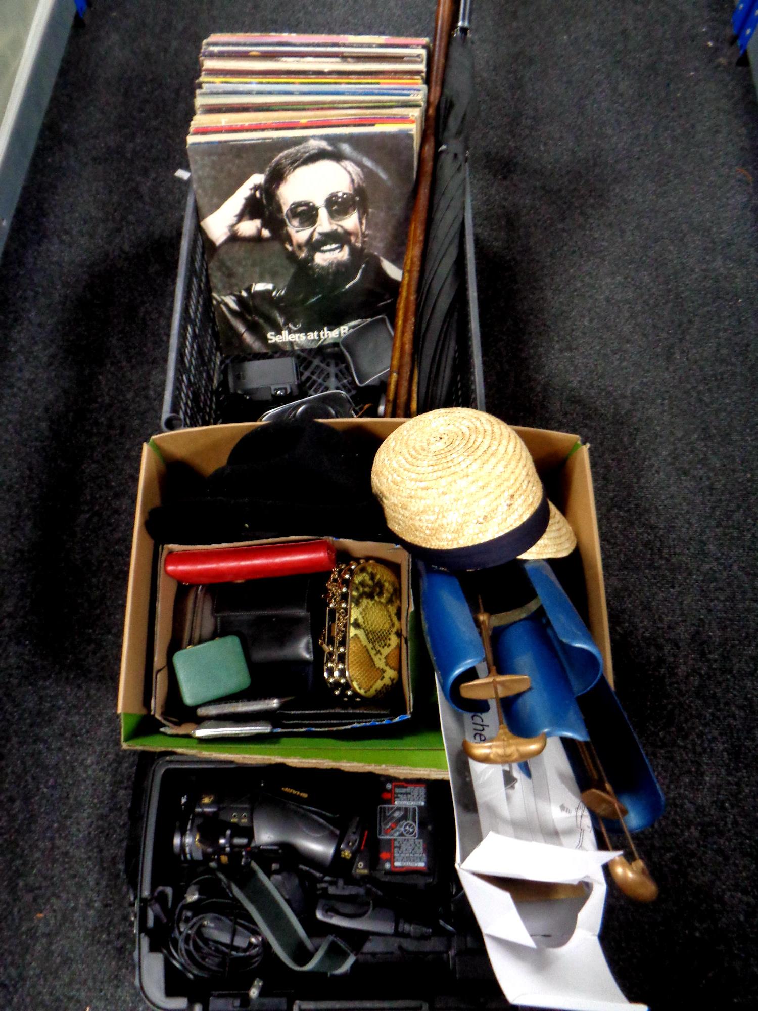 A box and crate of vinyl LP's, walking sticks, video camera, cameras,