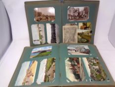 Two Edwardian postcard albums containing early twentieth century and later postcards