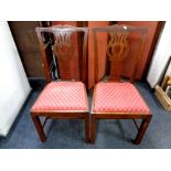A pair of Edwardian mahogany dining chairs