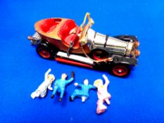 A Corgi Toys Chitty Chitty Bang Bang die cast vehicle with figures