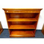 A set of Bradley yew wood open shelves, width 97 cm.