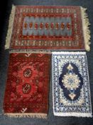 Three eastern rugs