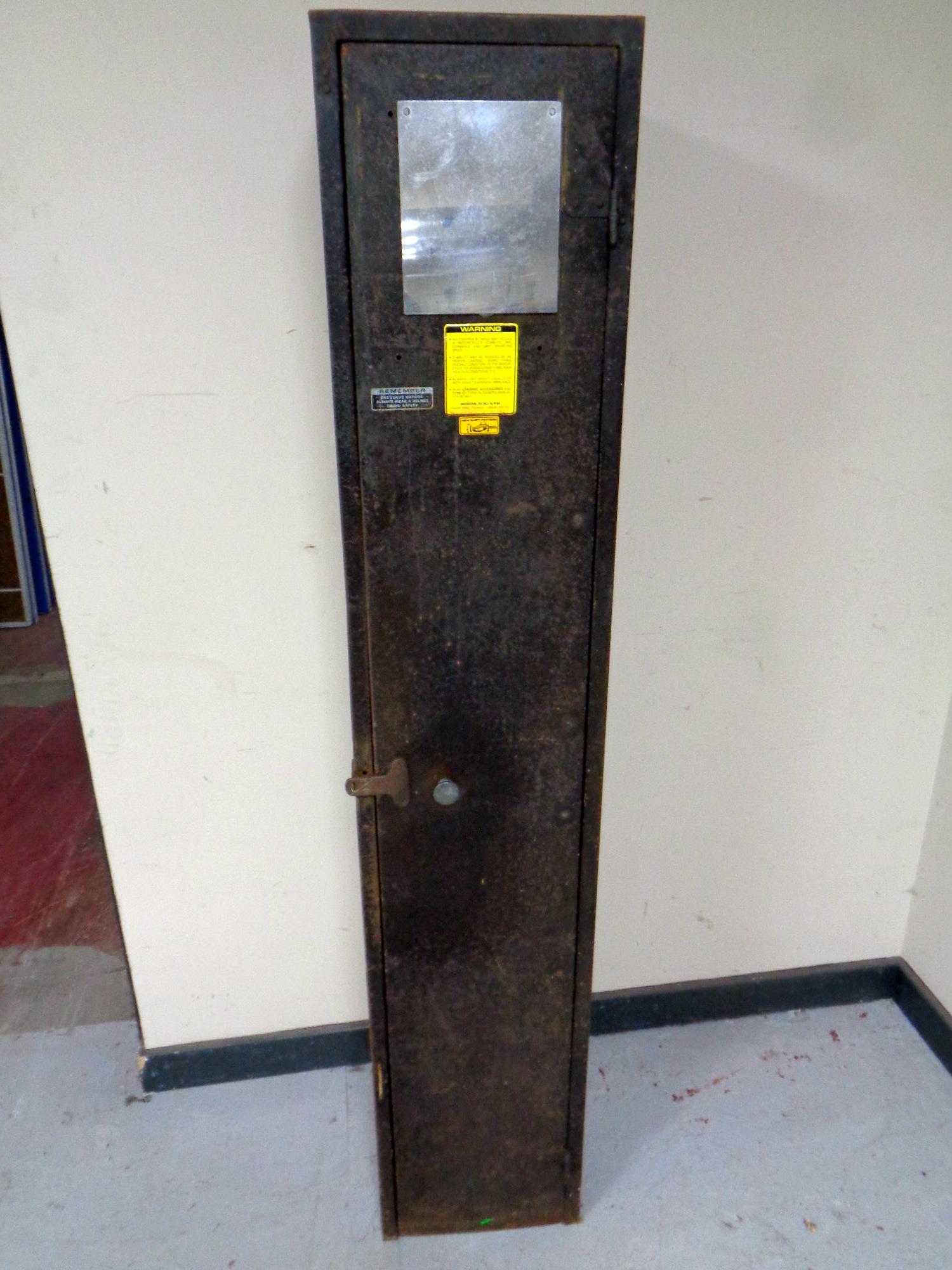 A metal single door locker, height 172 cm.